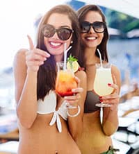 Two women enjoying cocktails
